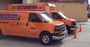 Water Damage Vans At Preparing To Go To Job Location