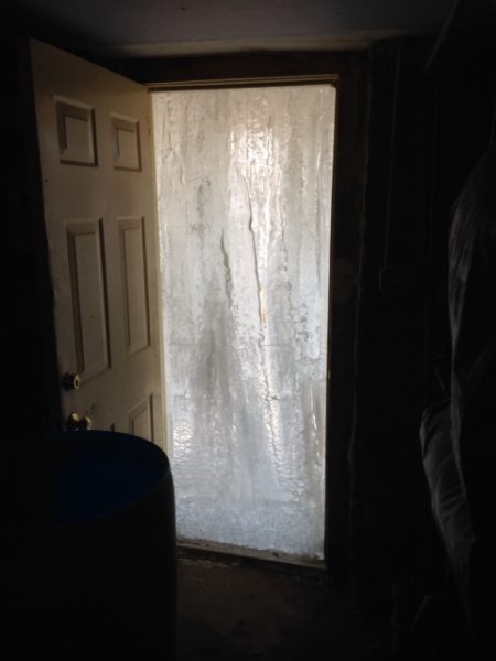 Storm Damage Ice Door