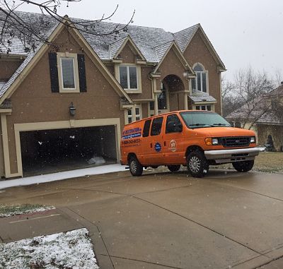 Water Restoration Van at a Residential Job Site