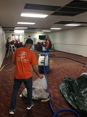 Our Technicians Conducting Water Restoration in a Commercial Building after a Storm